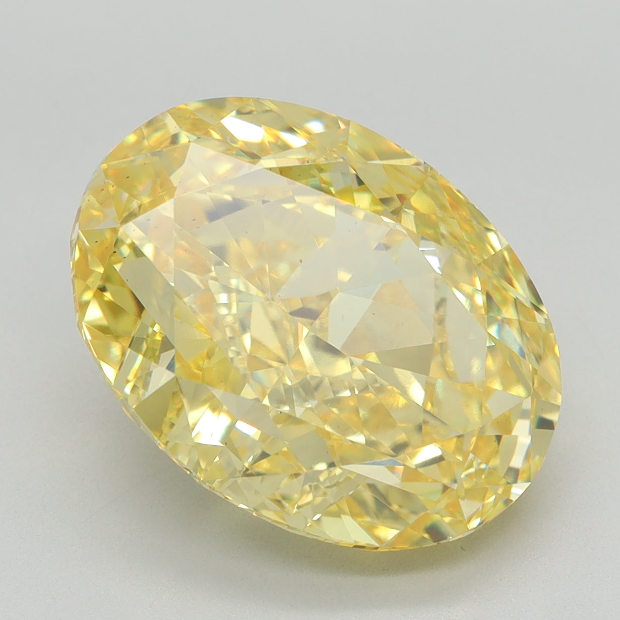 7.03 CT Oval Diamond YELLOW VS2