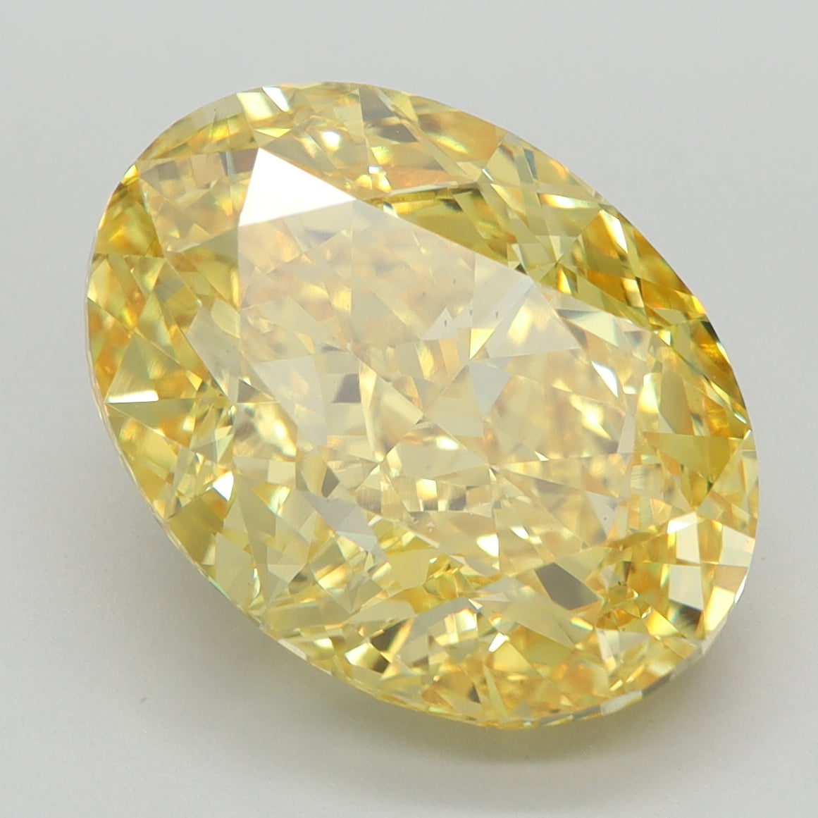 7.03 CT Oval Diamond YELLOW VS2