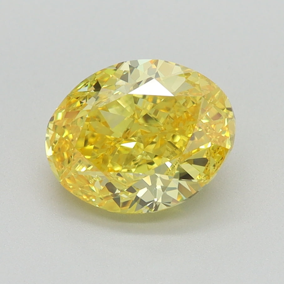 1.5 CT Oval Diamond YELLOW VS2